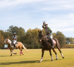 Polo team on horses